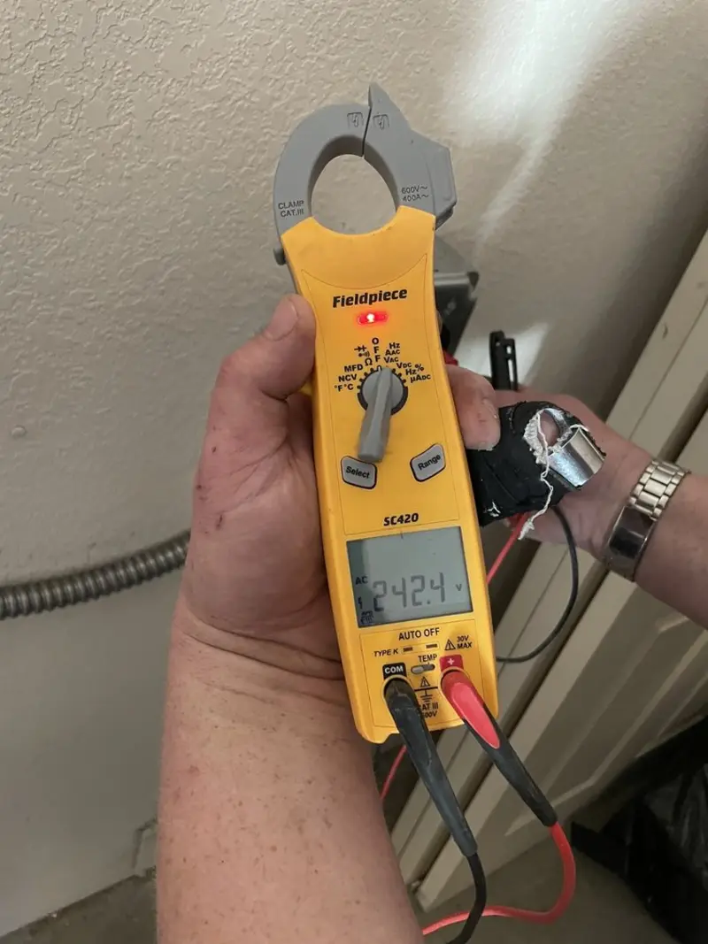 Voltage testing with clamp meter during Generator Installation in Fontana